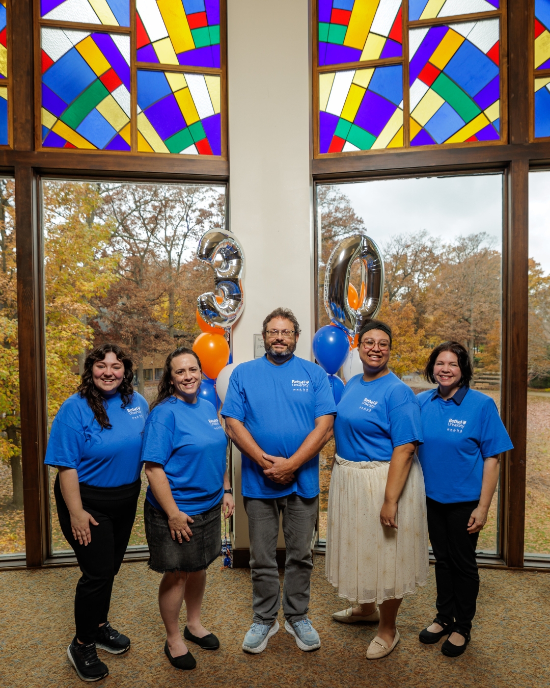 The ASLID Staff under 3-0 balloons