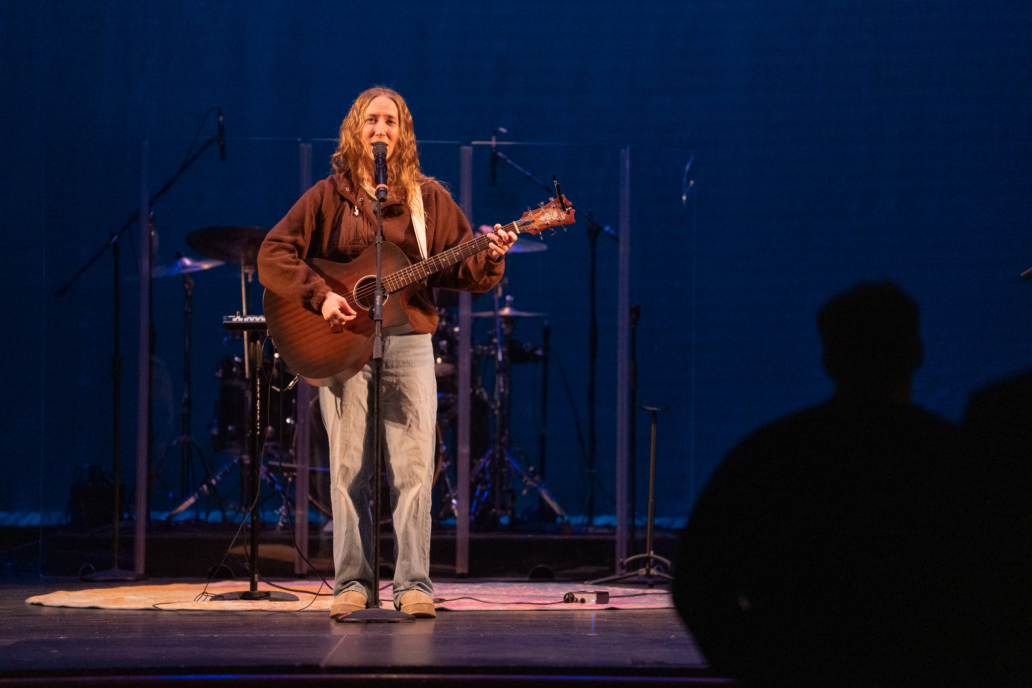 Bethel University Music Program with student with guitar on stage