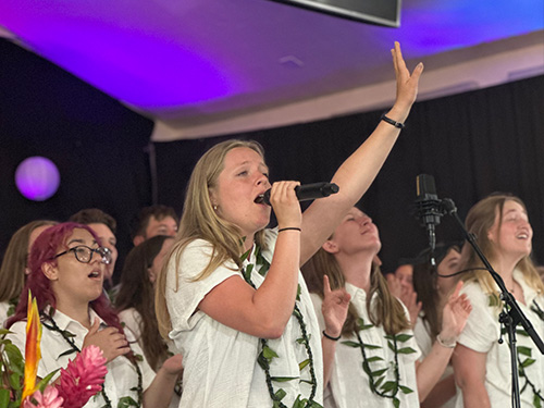 Eliza Weatherton singing in a choir