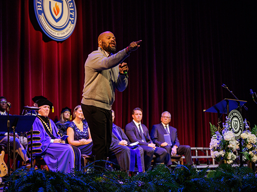 LaMorris Crawford giving a speech