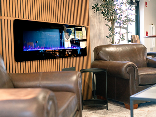 A view of the fireplace in Sufficient Grounds