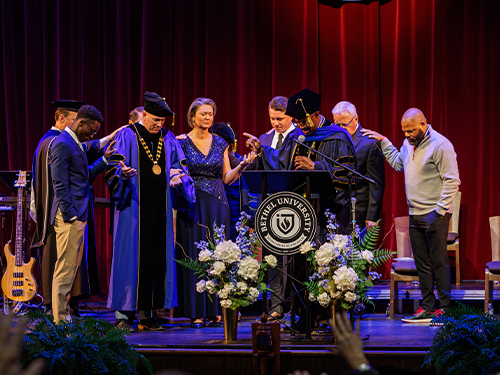 A group of people praying