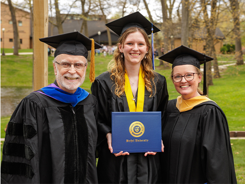 Norm Spivey with a recent graduate