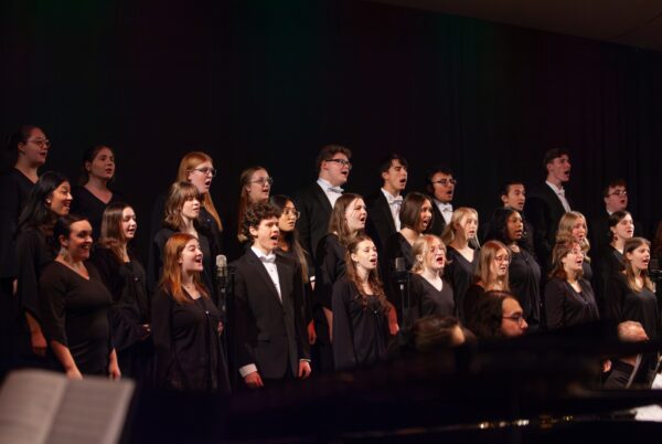 choir singing in formal clothing