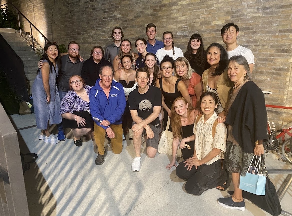 Bethel University students pose with cast members outside the stage door of the Tom Patterson Theatre following a performance of "Forgiveness".