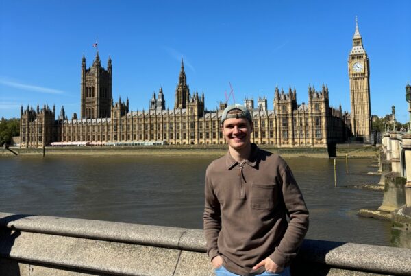 Bethel University graduate Mathis Neuhaus stands in front of the Palace of Westminster and Big Ben in London.