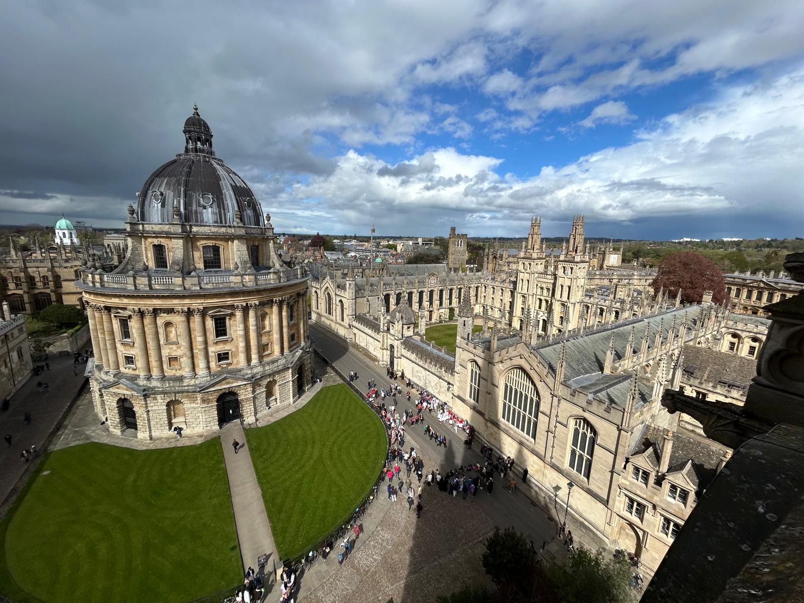 An elevated view of the University of Oxford campus featuring the Radcliffe Camera and All Souls College.