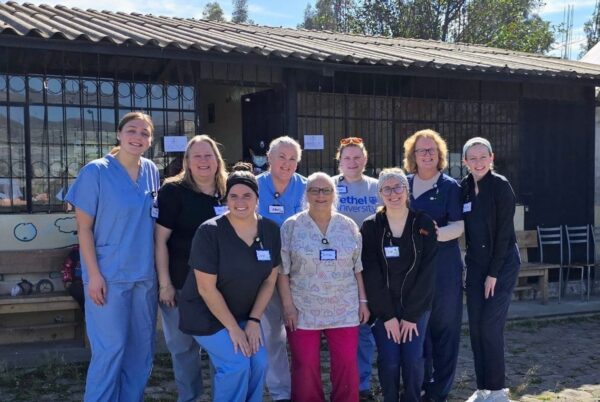 Bethel Nursing Task Force members gather outside one of the medical clinics where they partnered with local healthcare providers and missionaries.
