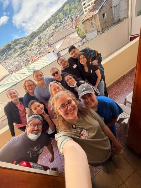 Bethel University Nursing Task Force members and local partners pose for a group photo overlooking the city of Quito, Ecuador.