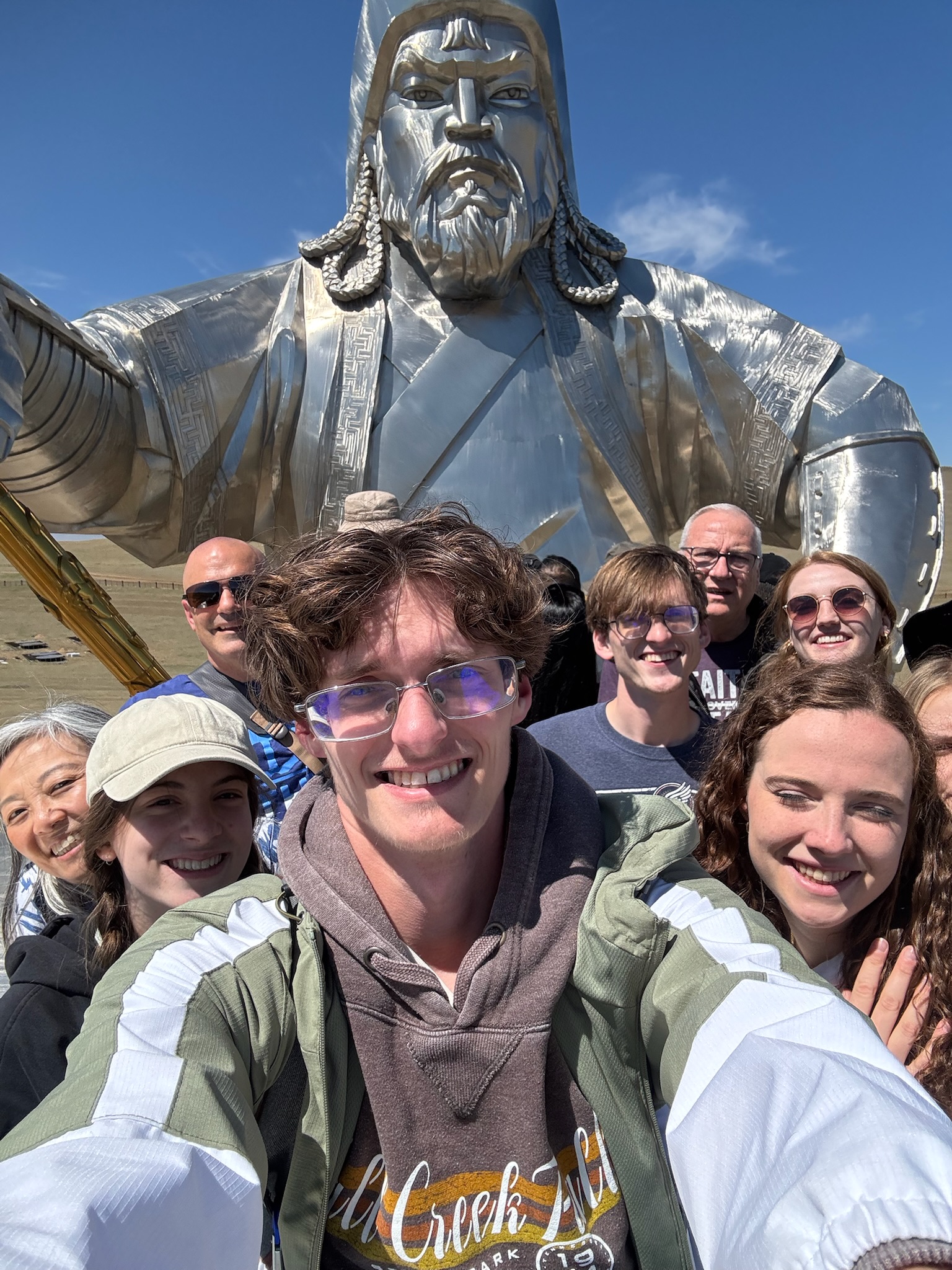 Bethel University Task Force members take a group selfie in front of the giant Genghis Khan statue in Mongolia.